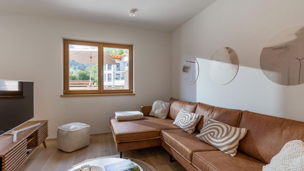 Kaiserwinkl Hideaway_Walchsee_Wohnraum_Couch Kaiserwinkl Hideaway_Walchsee_Wohnraum_Couch